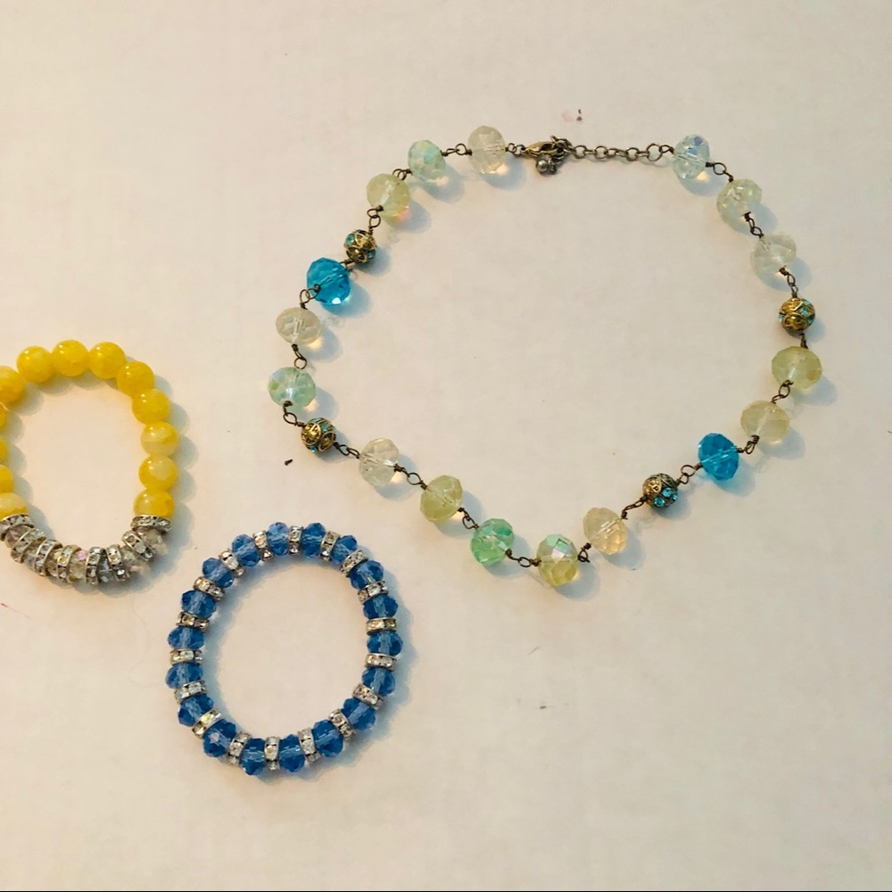 Necklace and two bracelets.